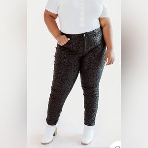 Glitzy girls animal print jeggings with button and zip fly.